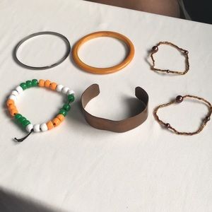 6 bracelets. Gun metal tone, beaded, coppe…